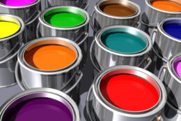 Paint cans with different colors of paint